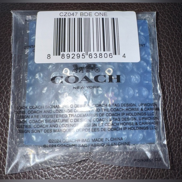 Coach P Initial Stud Earrings
Set - Picture 2 of 3